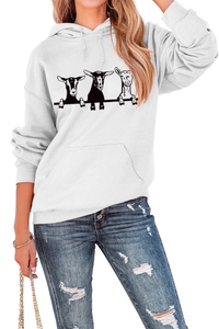 Close-up of women's white hoodie featuring artistic goat prints and casual kangaroo pocket