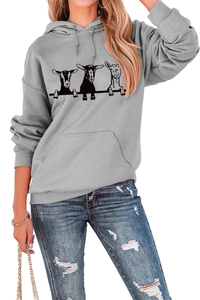 Detail of grey hoodie featuring playful goat print and adjustable drawstring hood