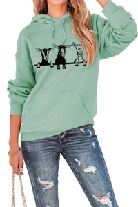 Close-up of mint green hoodie featuring three cute sheep print and kangaroo pocket