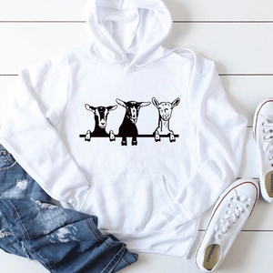 White oversized hoodie featuring cute black goat prints and a functional kangaroo pocket
