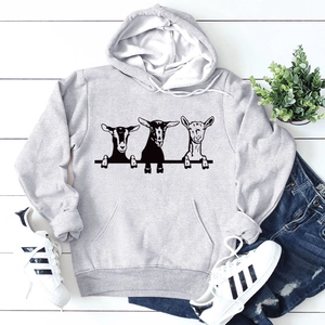 Detail of grey fleece hoodie with black goat print and front kangaroo pocket