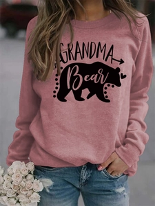 Detail of Grandma Bear lettering and bear silhouette on pink long sleeve sweatshirt
