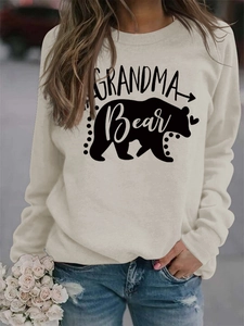 Detail of Grandma Bear letter print and bear silhouette on cream long sleeve sweatshirt
