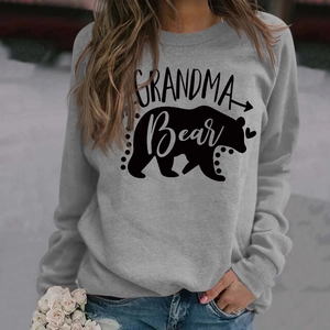 Detail of Grandma Bear print on a grey long-sleeve crewneck sweatshirt for women