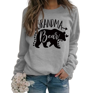 Detail of grey crewneck sweatshirt featuring black Grandma Bear graphic and letter print