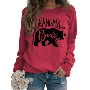 Detail of red Grandma Bear sweatshirt showing the bear silhouette and lettering print