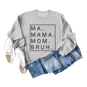 Flat lay of light grey MA MAMA MOM BRUH sweatshirt with denim jeans and sneakers