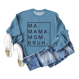 Flat-lay detail of crewneck sweatshirt showing ribbing and MA MAMA MOM BRUH slogan