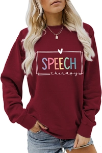 Close-up of Speech Therapy colorful letter print on burgundy crewneck sweatshirt