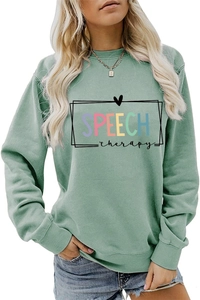 Detail of the colorful Speech Therapy rainbow print on a sage green long sleeve sweatshirt