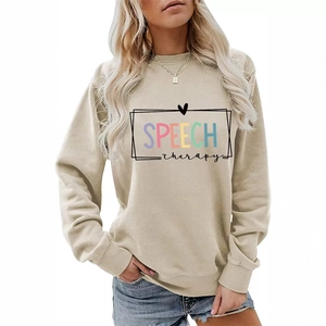 Beige crewneck sweatshirt featuring colorful Speech Therapy print and ribbed cuffs