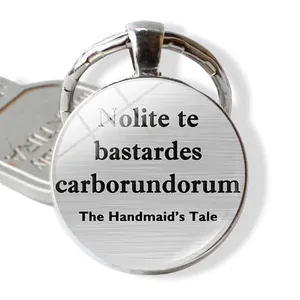 Handmaid's Tale quote keychain with Nolite te bastardes carborundorum engraving