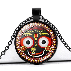 Hindu God Jagannath glass pendant necklace with black metal frame on white background