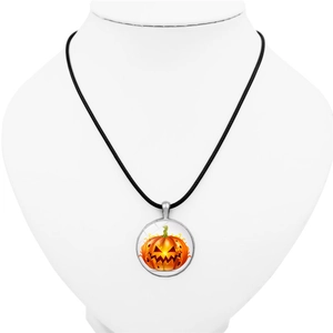 Halloween pumpkin jack-o-lantern glass pendant necklace on a black cord necklace