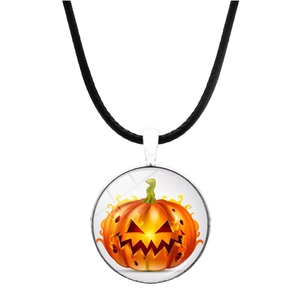 Detail of Halloween pumpkin glass pendant with polished alloy base and black cord necklace