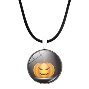Close-up of Halloween necklace featuring pumpkin jack-o-lantern glass pendant on black cord