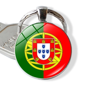 Detail of Portugal flag glass dome keychain with polished metal alloy keyring and base