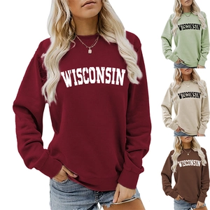Detail view of Wisconsin printed sweatshirts in burgundy, green, beige, and brown colors