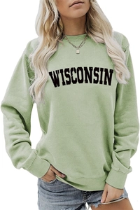 Close-up of Wisconsin varsity letter print on light green casual crewneck sweatshirt
