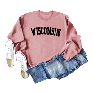 Detail view of pink Wisconsin sweatshirt with collegiate letters and soft cotton texture