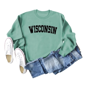 Flat lay of sage green Wisconsin sweatshirt with blue denim jeans and white canvas shoes