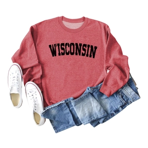 Detail view of Wisconsin letter print on brick red crewneck sweatshirt fabric texture