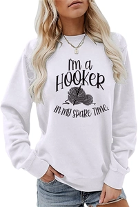 Detail of white cotton sweatshirt featuring humorous crochet typography and yarn ball print