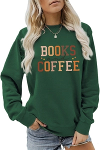 Close-up of ribbed cuffs and Books and Coffee print on dark green crewneck sweatshirt