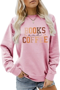Detail of the ribbed crewneck and artistic Books and Coffee print on pink sweatshirt