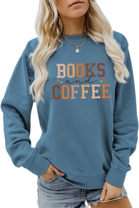 Detail of Books and Coffee graphic print on navy crewneck sweatshirt with ribbed cuffs