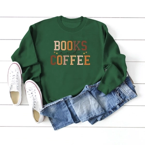 Flat lay of forest green Books and Coffee crewneck sweatshirt with retro letter print