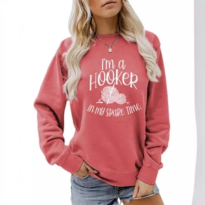 Coral red crewneck sweatshirt with 'I'm a Hooker' slogan and yarn illustration