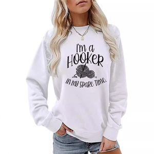 White long sleeve crewneck sweatshirt featuring funny hobby slogan and yarn ball illustration