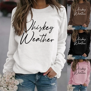 Detail shot of Whiskey Weather script print on long sleeve crewneck sweatshirt for women