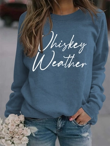 Detail of Whiskey Weather white letter print on a navy blue long sleeve crewneck sweatshirt