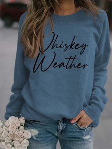 Detail of Whiskey Weather script print on misty blue long sleeve crewneck sweatshirt
