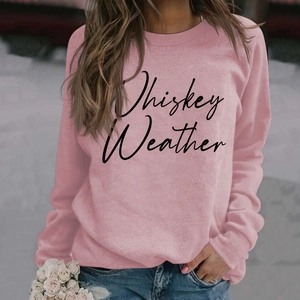 Detail of pink Whiskey Weather sweatshirt featuring soft fabric and drop shoulder design