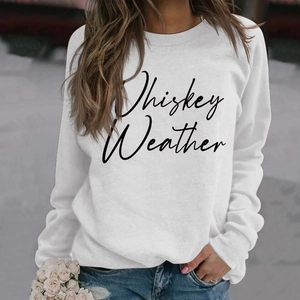Detail of Whiskey Weather script print on white long sleeve crewneck sweatshirt