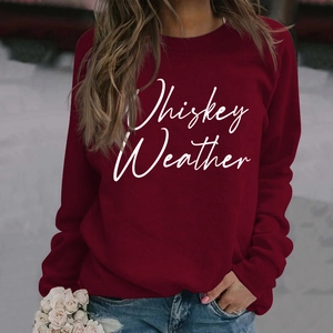Detail of burgundy Whiskey Weather print sweatshirt with soft cotton texture