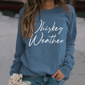 Detail of Whiskey Weather printed graphic on a navy blue long sleeve casual sweatshirt