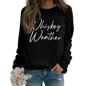 Detail of Whiskey Weather print on casual black long sleeve crewneck sweatshirt