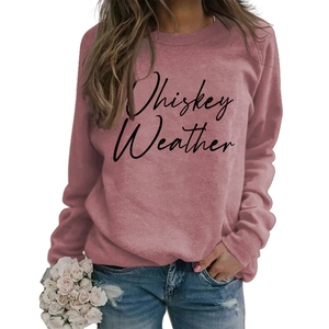 Detail of Whiskey Weather graphic print on long-sleeved dusty rose sweatshirt