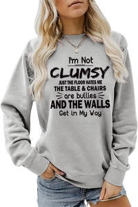 Close-up of funny text print on gray long-sleeve sweatshirt with crew neck design