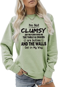 Close-up of light green round neck sweatshirt with humorous English printed slogan