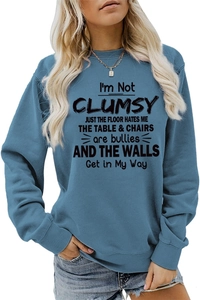 Detail of foggy blue round neck sweatshirt with black letter print and ribbed cuffs