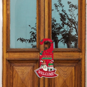 Red Christmas gnome door hanger with Merry Christmas and Welcome text on wooden door