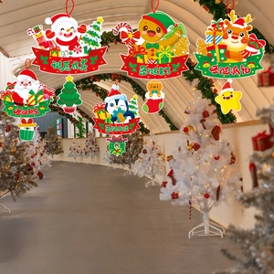 Detailed view of colorful paper Christmas ceiling ornaments with cute cartoon characters