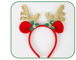 Detail of Christmas reindeer headband with gold sequin antlers and festive bells