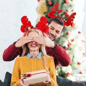 Christmas reindeer antler headbands with sequins and bows for festive party decorations