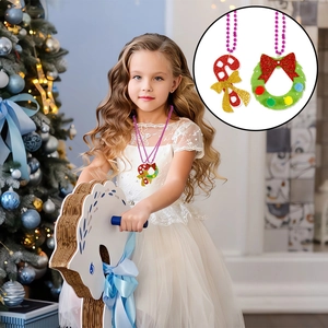 Detail of Christmas beaded necklace with candy cane and festive wreath pendants for girls